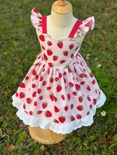 Cute Ruffled Sundress For Picnic, Strawberry Print Dress For Garden Party In Summer, Summer Strawberry Print Dress For Garden Party, Sweet Summer Dress For Picnic, Summer Garden Party Dress With Strawberry Print, Cute Fitted Sundress For Picnic, Cute Cherry Print Summer Dress, Playful Cotton Dress For Picnic, Red Strawberry Print Dress For Summer