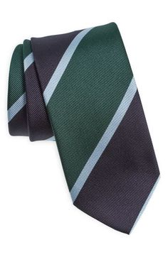 Blocky stripes bring traditional, old-school design to a tie that's crafted from polished silk and styled to smarten any formal or semiformal look. 100% silk Dry clean Made in the UK Classic Ties With Vertical Stripes, Classic Tailored Green Suit And Tie Accessories, Classic Green Ties For Formal Occasions, Dapper Green Ties For Business, Green Dapper Ties For Business, Classic Green Formal Tie, Green Dapper Business Ties, Formal Striped Fitted Suit And Tie Accessories, Classic Pinstripe Ties For Formal Occasions