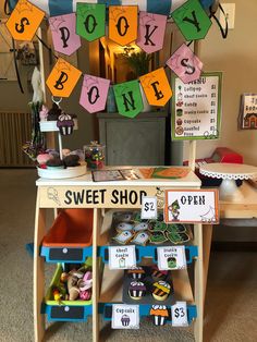 an assortment of books and toys on display at a book store for children's birthday party