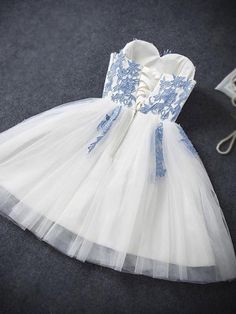 1, Material: lace, aplique, tulle, elastic satin like silk.2, Color: it can be in custom color, please contact us and tell us dress number, then we will send you more colors to choose.3, Size: can do both standard size and custom size. If you need do custom sized dresses, please send us following measurements or leave a note when place an order.bust______ cm/inchwaist______cm/inchhip:_______cm/inchdress length:_______cm/inchshoulder to shoulder :_______cm/inch (measured from back of shoulder)sho White Prom Dress Short, Short Strapless Prom Dresses, Elegant Homecoming Dresses, Floral Homecoming Dresses, Cheap Party Dresses, Mini Homecoming Dresses, Cheap Homecoming Dresses, Tulle Homecoming Dress, Junior Prom Dresses