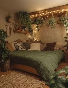 a bedroom with plants and lights on the wall