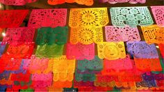 colorful paper doily hanging from the ceiling