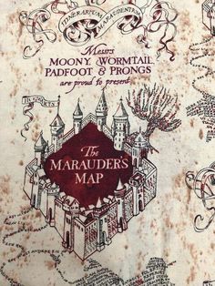 the maraauers map is covered in red ink and has writing on it that says moony, wormtail, padfoot & prings