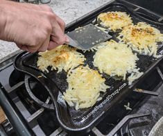 someone using a spatula to grate cheese on top of an oven burner