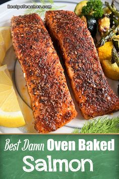 two salmon fillets on a plate with lemons and broccoli next to the words best damn oven baked salmon