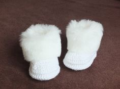 White Baby booties  Faux fur boots  Baby winter by HandmadebyInese White Winter Booties As A Gift, White Booties As Winter Gift, White Winter Booties As Gift, White Round Toe Winter Booties, Cute White Winter Booties, Warm White Winter Booties, White Knitted Booties For Winter, White Crochet Booties With Round Toe, Infant Winter Shoes