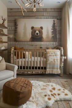 a baby's room with a bear painting on the wall and a crib