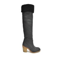 Chanel knee high shearling lined boots in soft black leather with small silver CC logos on the back. Feature crepe gum soles and block heels. The boots are meant to have a slouchy fit and can be cuffed at the top to show the shearling lining. Brand = Chanel Condition = 8/10, gently worn Size = 40 Heel Height = 100mm Material = Leather, Shearling SKU = 22737-1 Winter Knee-high Boots With Suede Lining And Round Toe, Winter Heeled Boots With Leather Sole, Shearling Boots With Leather Lining For Winter, Winter Shearling Boots With Leather Sole, Winter Boots With Wool And Leather Lining, Winter Sheepskin Boots With Leather Lining, Winter Knee-high Heeled Boots With Suede Lining, Winter Leather Knee-high Boots With Suede Lining, Knee-high Leather Sole Winter Boots