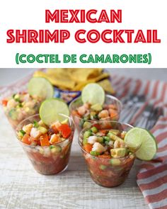 mexican shrimp cocktail in small glasses with limes and cilantro on the side