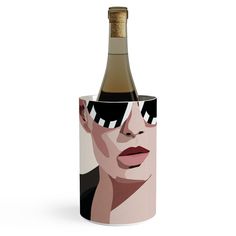 a wine bottle holder with a woman's face painted on the front and side