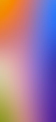 a blurry image of an orange, blue and green background with the colors red