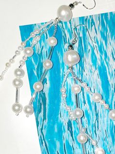 Composition : Freshwater pearls, seed beads, 925 silver needlesCountry of Origin : Republic of Korea White Pearl Beaded Drop Earrings, White Pearl Drop Beaded Earrings, Handmade Pearl White Pearl Earrings, White Beaded Pearl Earrings, Pearl Beaded Drop Earrings With Pearl Charm, White Pearl Beaded Earrings For Party, Beaded Pearl Dangle Jewelry, Pearl Beaded Dangle Jewelry, Pearl White Dangling Bead Earrings