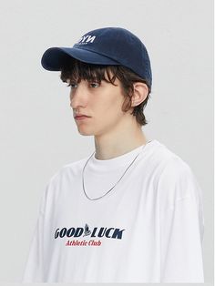 This classic and versatile ball cap features reversed lettering graphic embroidery that's inspired from travel. It's made from seasonless cotton with bio washing for natural styling. - Lettering embroidery at front- Stitched brim- Embroidered eyelet- Adjustable back strap- Six panel construction- Bio washing- Unisex wear Cotton Snapback Hat With Short Brim For Streetwear, Cotton Trucker Hat With Short Brim For Streetwear, Cotton Short Brim Trucker Hat For Streetwear, Cotton Trucker Hat With Letter Embroidery And Curved Visor, Cotton Dad Hat With Letter Embroidery For Streetwear, Classic Cotton Baseball Cap With Letter Print, Casual Dad Hat With Embroidered Logo, Casual Trucker Hat With Letter Embroidery And Curved Brim, Casual Dad Hat With Letter Embroidery For Streetwear