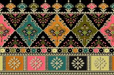 a colorful rug with many different designs and colors on the side, including flowers and leaves