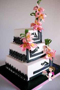 a three tiered cake with pink flowers on top and black lace around the edges