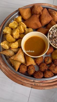 a platter filled with different types of food