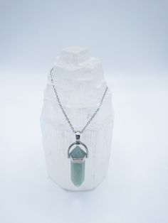 This beautiful necklace features a green aventurine crystal point on a black strand or silver chain. Green Aventurine: The opportunity stone, luckiest of all crystals especially in manifesting prosperity and wealth or increasing favor in games of chance. Aligns conditions so opportunity is inevitable. Releases old habits so new growth can occur. It brings optimism and zest for life as you embrace change and move forward with confidence. Silver Aventurine Crystal Necklace For Healing, Green Adventure Crystal Necklace, Adjustable Green Aventurine Crystal Necklaces, Green Aventurine Gemstone Crystal Necklace, Green Aventurine Gemstone Necklace, Spiritual Aventurine Pendant Crystal Necklace, Green Aventurine Crystal Necklace Gift, Green Aventurine Pendant Crystal Necklace, Manifesting Prosperity