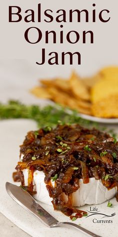 an image of a plate with food on it and the words balsamic onion jam