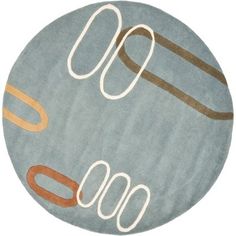 a round rug with an abstract design on it