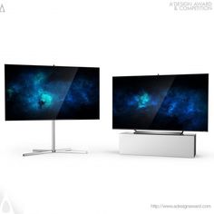 two computer monitors sitting side by side in front of a white background with the same image on it