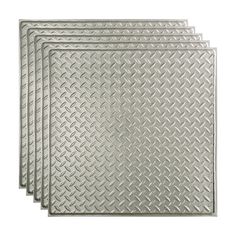 four metallic diamond plated placemats on a white background