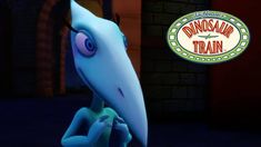 a cartoon character with big eyes and an enormous beak in front of a sign that says dinosaur train