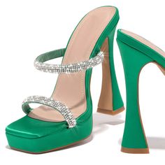 Elevate your style with these Green Satin Platform High Heels. Featuring a square toe and dazzling rhinestone embellishments, these mules exude glamour and sophistication, perfect for any special occasion. Color: Green Material: Satin Heel Type: Flared heel Heel height: 5.51" / 140 mm approx Product measurements were taken using size 8. Please note that measurements may vary by size. Toe: Open toe With platform Rhinestone embellishment Handcrafted US sizing. Fits true to size. Female Slippers, Nude Boots, Sandals High Heels, Driving Shoes Men, Luxury Shoes Women, Basic Heels, Buckle Ankle Boots, Rhinestone Sandals, Outdoor Sandals