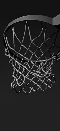 a black and white photo of a basketball net