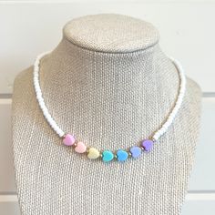 "This pastel heart necklace will be the cutest accessory for any outfit! You have found the sweetest gift for any little girl 💗 It is 15\" and this stretchy necklace fits right over your head so it's easy to put on- no clasps needed.  🤍 Please check all selections prior to check out. Our custom jewelry is made to order so all sales are final.  🤍 The necklace is beautifully packaged and ready to gift. Receipts are never included. If you want to include a special note, please let me know in the Kids Jewelry Diy, Pastel Kidcore, Toddler Necklace, Toddler Jewelry, Kids Jewellery, Pastel Heart, Girls Necklace, Diy Jewelry Unique, Jewelry Heart