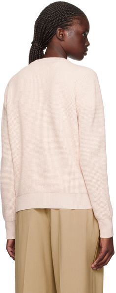 Waffle knit wool sweater. · Rib knit crewneck, hem, and cuffs · Logo graphic embroidered at front Supplier color: Pale pink Pink Cashmere Sweater With Ribbed Cuffs, Pink Cashmere Sweater For Work, Pink Crew Neck Cardigan With Textured Knit, Pink Textured Knit Cardigan With Crew Neck, Cozy Pink Sweater With Ribbed Cuffs, Pink Crew Neck Sweater For Work, Casual Pink Wool Sweater, Knit Crewneck, Logo Graphic