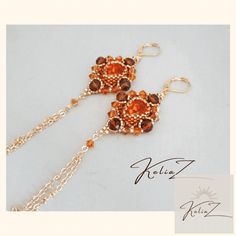 Unmissable! Check out this Red orange chandelier earrings Drop crystal cabochon earrings Gold plated 24k Trendy earrings only at €145.00. #DesignerJewelry #GoldPlatedEarrings #TrendyEarrings #LongBrightEarring #WristJewelry #24KFittings #EarringsChains #LuxuryFittings #ModernEarrings #CabochonEarrings Elegant Orange Chandelier Earrings For Gift, Elegant Orange Chandelier Earrings Gift, Elegant Orange Beaded Chain Jewelry, Orange Chandelier, Cabochon Earrings, Wrist Jewelry, Trendy Earrings, Earrings Drop, Modern Earrings