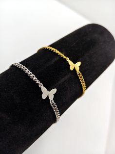 ❤️Introducing our Dainty Women Butterfly Charm Bracelet, a beautifully minimalist piece perfect for gifting. Customized with an initial-engraved tag on a personalized curb chain bracelet, it's designed to symbolize transformation and personal growth. Each bracelet is crafted for comfort fit, making it a joy to wear every day.❤️ ❤️Ideal for any occasion, from anniversaries to birthdays, this fashion bracelet makes a heartfelt gift for your girlfriend, wife, sister, or BFF. Its tarnish resistance ensures long-lasting beauty, blending effortlessly with both hip hop wear and streetwear styles.❤️ 🥰Our shop is committed to excellence, offering you a product that not only meets but exceeds your expectations.  🔆 EXCEPTIONAL CRAFTSMANSHIP: Each of our Jewelry is a masterpiece of detail and design Adjustable Minimalist Stainless Steel Charm Bracelet, Minimalist Adjustable Stainless Steel Charm Bracelet, Minimalist Hypoallergenic Stainless Steel Bracelets, Dainty Stainless Steel Bracelet With Adjustable Chain, Minimalist Stainless Steel Bracelet For Gift, Minimalist Stainless Steel Bracelet As Gift, Trendy Charm Bracelet With Delicate Chain As Gift, Minimalist Charm Bracelet With Adjustable Chain, Minimalist Delicate Chain Bracelet As A Gift