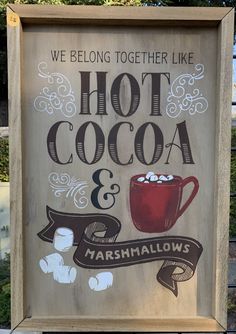 a sign that says we belong together like hot cocoa and marshmallows