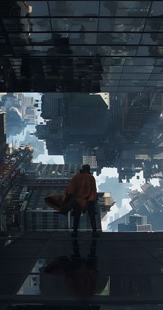 a man standing on top of a tall building next to a city filled with tall buildings