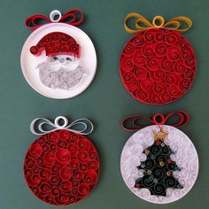 three christmas ornaments made out of rolled paper