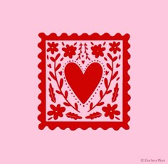 a red and white paper cutout with a heart in the center on a pink background