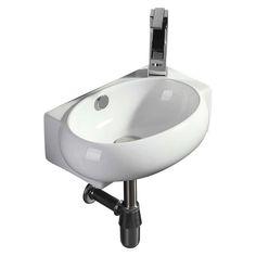 a white bathroom sink sitting on top of a metal stand next to a faucet