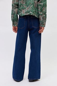 Throwback-style bell bottom jeans in 14oz. BDG denim. Relaxed fit jeans with a slouchy loose leg and wide leg openings. Only at Urban Outfitters. Features BDG Slacker relaxed fit jeans Bell bottom jeans by BDG Mid rise waist 14 oz. denim 5-pocket; zip fly Slouchy & loose fit Flared legs UO exclusive Content + Care 100% Cotton Machine wash Imported Size + Fit Model is 6'2" and wearing size 32 Rise: 10" Inseam: 33" Leg Opening: 12.5" | BDG Slacker Relaxed Fit Jean in Tinted Denim, Men's at Urban O Relaxed Fit Jeans, Mens Bottom, Vintage Denim, Jeans Style, Bell Bottom Jeans, Jeans Fit, Mens Jeans, Urban Outfitters, Fitness Models