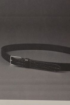 Narrow minimalist leather belt, expertly finished in croc print leather with hand waxed edges. Fine buckle in polished gold.