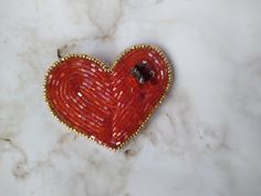 A luxurious brooch will be a unique gift for your mom, girlfriend, boyfriend, sister, colleague.  Spectacular brooch will fit with any clothes or a hat. I carefully design and create each jewelry. This is unique design. Each brooch is hand made with love. Find more accessories: https://www.etsy.com/shop/JustKnititUA Orders will be shipped within 1-3 business days. Unique Heart-shaped Jewelry Brooch, Heart-shaped Pins For Valentine's Day Gift, Heart-shaped Valentine's Day Brooch Pin, Heart-shaped Valentine's Day Pins, Heart-shaped Brooch Jewelry Gift, Heart-shaped Brooches For Valentine's Day Gift, Heart-shaped Brooch For Valentine's Day Gift, Handmade Heart Brooches For Valentine's Day, Handmade Heart Shaped Brooches For Valentine's Day