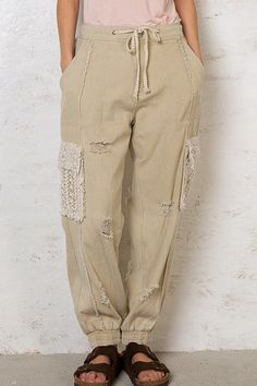 Step out in style in the Sandbox Pants Beige. These khaki drawstring joggers add a touch of edge to your every day wardrobe. Featuring distressing detail throughout and lace detail on two of the side pockets, these pants are both stylish and practical... New Look Dresses, Lace Pocket, Girls Joggers, Fitted Joggers, Drawstring Jogger, Trench Jacket, Denim Joggers, Shoe Fits, Sandbox