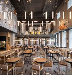 an empty restaurant with many tables and chairs