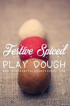 three different colored balls sitting next to each other with the words festive spiced play dough