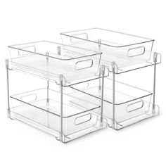 three clear plastic drawers sitting next to each other