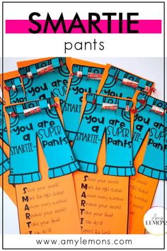 some blue and orange tags with the words smartie pants written on them in black