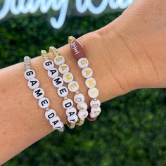 Our gold beaded game day bracelets give you a touch of style that lasts all season. Mix and match the plated pieces to create a custom look, and pair with your favorite bracelets for a unique look on game day. Letter Games, Clay Bracelet, Top Knot Headbands, Bracelet Ideas, Stackable Bracelets, Heishi Beads, Black Letter, Gold Letters, Knot Headband