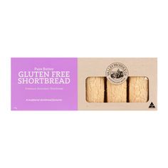 three slices of gluten free shortbread in a cardboard package on a white background