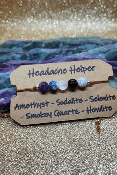 If you struggle with stress and tension causing headaches, the headache helper sliding knot adjustable bracelet may be for you (not meant to replace medical interventions)  Amethyst is a natural tranquilizer that eases and alleviates pain / also a stone of peace and serenity  Sodalite promotes calmness of the mind / clears away mental fog associated with headaches  Selenite cleanses energy / washes away stress and tension associated with headaches  Smokey Quartz  reduces stress and tension associated with headaches or that can trigger migraines  Howlite decreases stress and tension in the mind and body Adjustable Friendship Bracelets For Healing, Adjustable Spiritual Friendship Bracelets With Sliding Knot, Adjustable Spiritual Friendship Bracelet With Sliding Knot, Adjustable Holistic Beaded Bracelets As Gift, Adjustable Minimalist Bracelets For Meditation, Minimalist Adjustable Bracelet For Meditation, Minimalist Adjustable Bracelets For Meditation, Adjustable Bracelets For Friendship, Adjustable Bracelet For Friendship