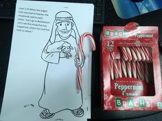 a package of peppermint candy canes next to a drawing