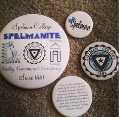 three badges on the floor with information about their respective college and other things in them